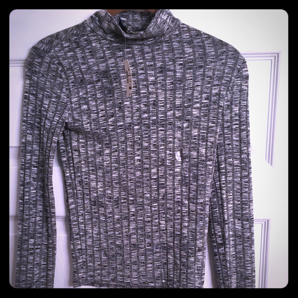 Black and white half turtle neck.
